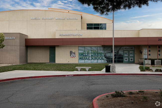 Entrance for administration building at drop off circle for students at Amelia Earhart Middle.