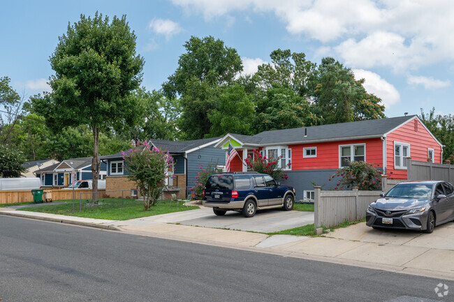 A row of colorful homes line Tanglewood Drive in Edmonston.