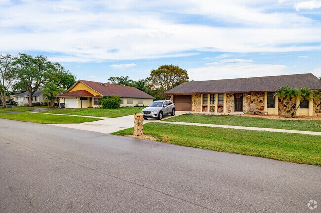 Charming ranch homes nestled in Abbey Park's serene streets.