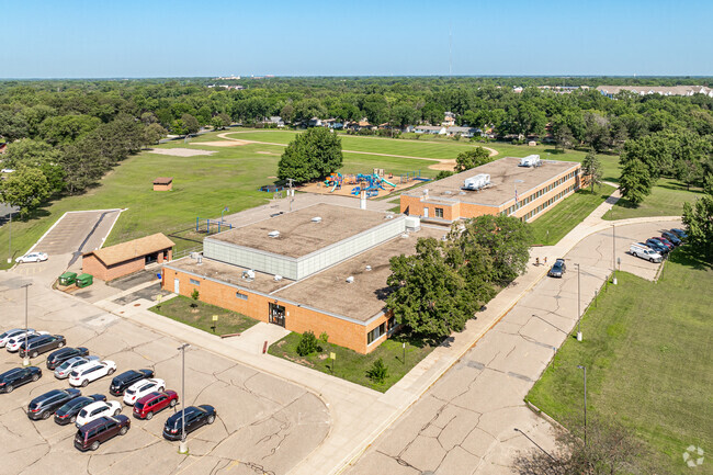 Mississippi Elementary School features a large outdoor greenspace and playground