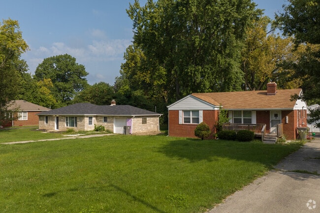 A row of modest brick single story homes found in northern East Gate.