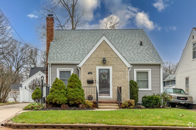 This stone siding Tudor style home has been well maintained in West Peoria.