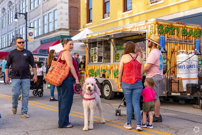 Families, pets, and food lovers enjoy the lively atmosphere of the Terre Haute Night Market.