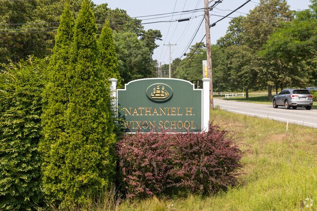 A grand sign welcomes you to Nathaniel H. Wixon Innovation School in Dennis.
