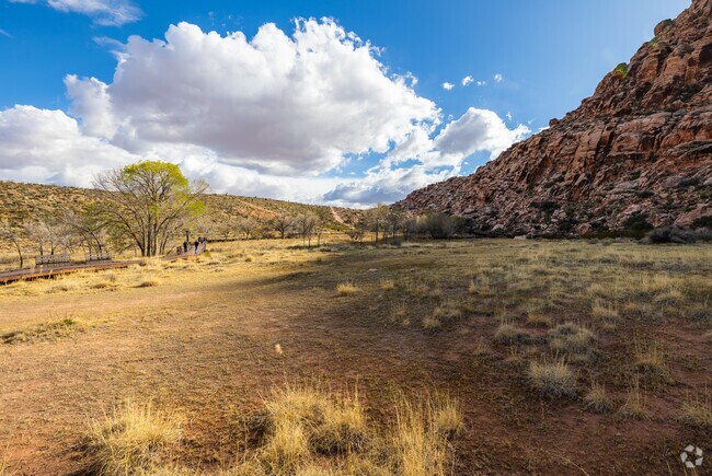Red Rock Canyon neighbors Queensridge and offers visitors walks through serene landscapes.