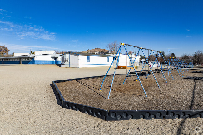 The swing set at Lena Juniper Elementary School.