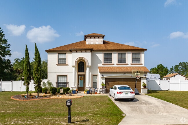 A beautiful two story home with Spanish stylings in Liberty.