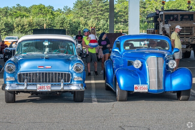 Bourne families take in the immaculate classic vehicles at the Archive Sandwich Monday Night Car Show.