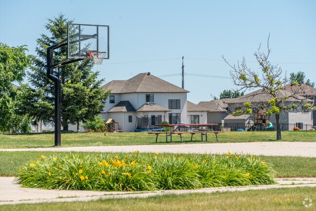 Burlington Commons offers a perfect spot for basketball enthusiasts with its inviting court.