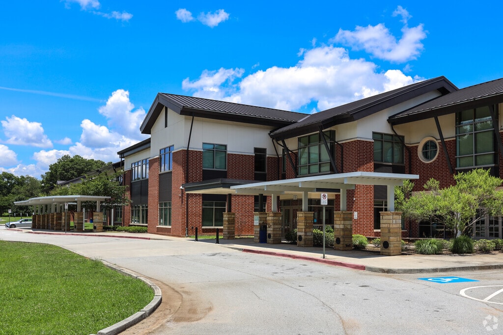 Children begin schooling at College Park Elementary, which scores a C.