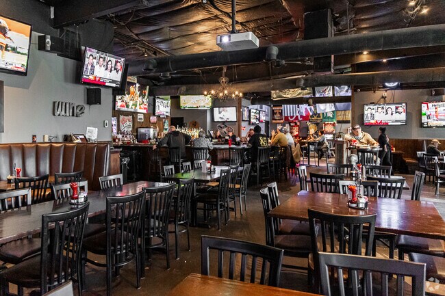 Santa Fe residents flock to local bars to spend time with neighbors and friends.