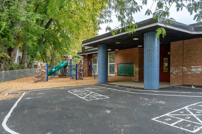 Robert Louis Stevenson Elementary School features a playground for children.