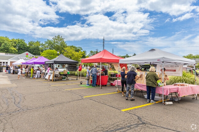 Find fresh produce and local goods at the Darien Farmers Market in Downtown Darien.