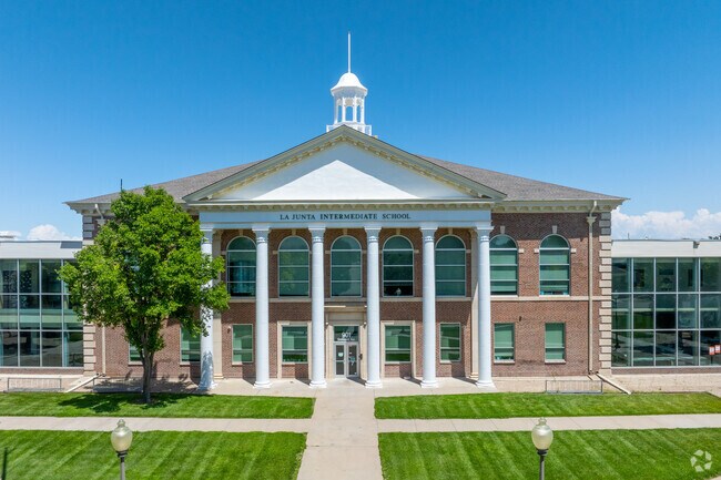 Built in the mid-20th century, La Junta Intermediate School in La Junta reflects practical post-war public architecture with brick construction, long classroom wings, and large windows that welcome natural light.