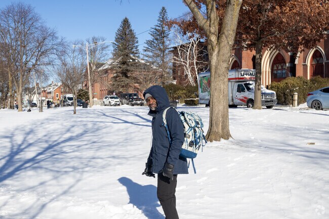 The penetrating cold of Lewiston winters compels residents to wrap themselves in their warmest coats.