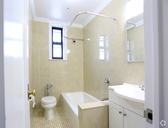 bathroom with tub and shower