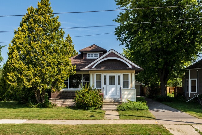 10-entrance door & minimal landscaping located in Congress Field.