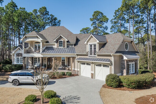 Saint James has stunning custom-built homes with spacious lawns that back up to a golf course.