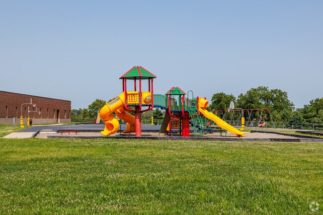 Playground equipment awaits students at Century Elementary School.