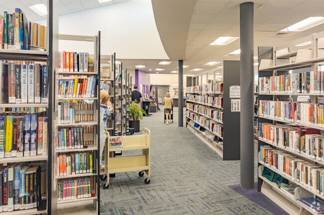 Jacaranda West residents enjoy spending time in the library.