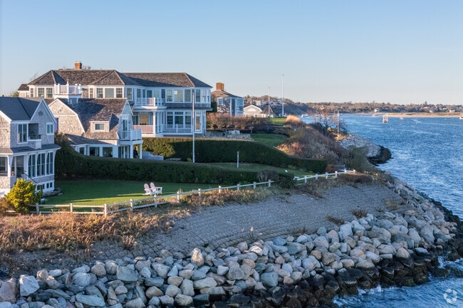 Many residents in Chatham Harbor embrace the beach-town vibe, complete with many yards featuring the classic Adirondack chairs and white-picket fences.