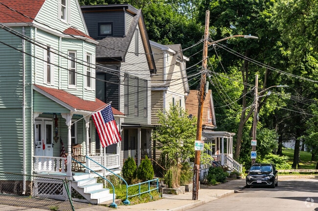 Single-family homes still appear across Savin Hill alongside condos.
