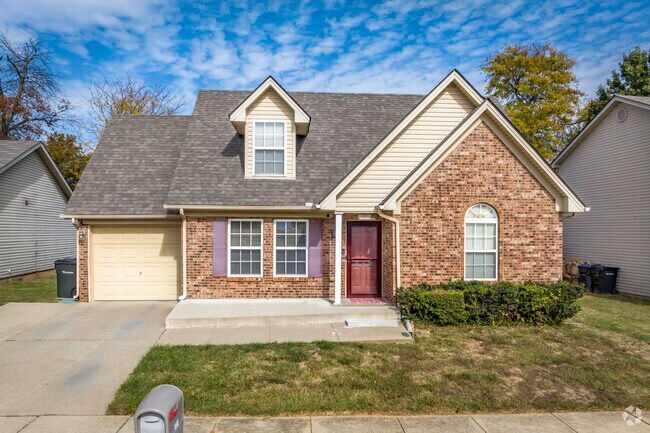 Some single homes in Georgetown have brick faces with dormer windows.