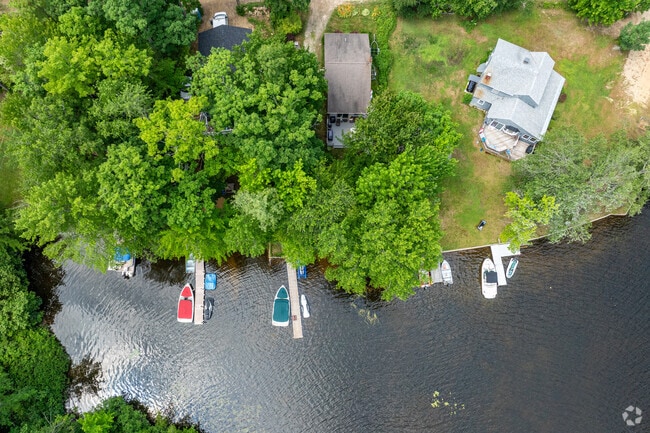 A group of lakeside homes with private docks along the Lower Suncook Lake in Barnstead, NH.