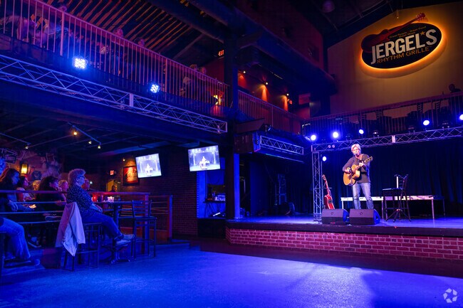 Bill Deasy performs for the patrons of Jergel's Rythm House in Marshall Township.