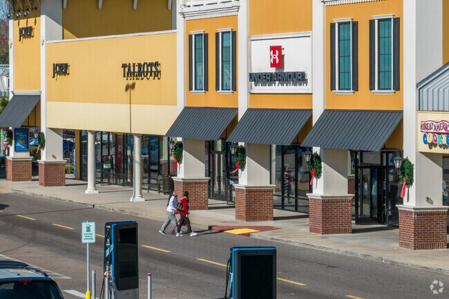 Residents can shop hundreds of designer stores at Tanger Outlets, near Darrow.