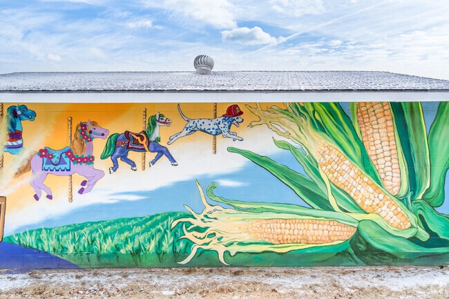 Angell Park has several murals depicting the sweet corn festival and other local events.