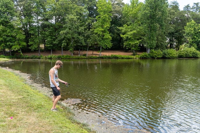 Locals enjoy fishing at Old Kernersville Lake in the Woodbridge neighborhood.