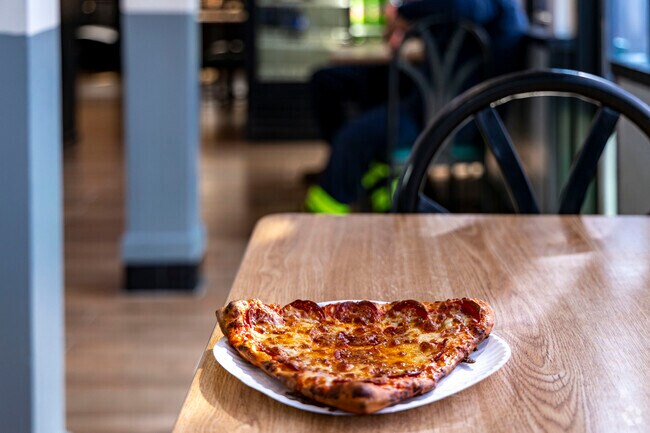 Grab a slice of pizza from Paradise Pizza in Norview.