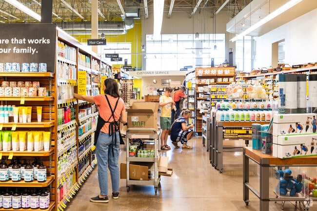 Whole Foods in Brookside Village has a large vitamin and supplement section.