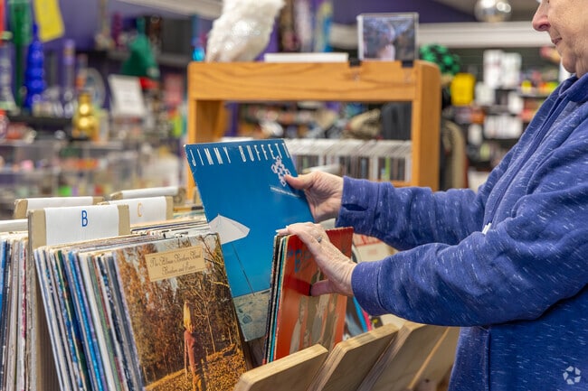 Revolution is a family owned business offering vinyl and other local goods.