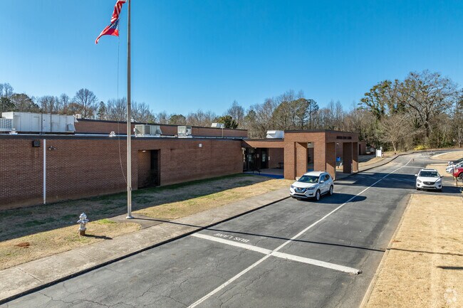 Adamson Middle School is located in the nieghborhood of Rex.