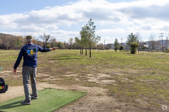 Disc golfers enjoy a large course at Niklaus Park in Fairway Canyon.