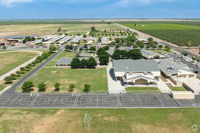 Pixley Middle School provides large green areas and basketball courts for students to use.