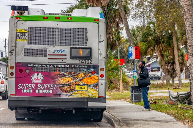 Bus stops sit on the edge of Coquina Key neighborhood to help you get to your destination.