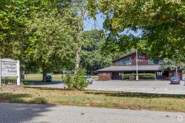 The Barrington Christian Academy in Barrington has a Cedar Hall that looks like a log cabin.