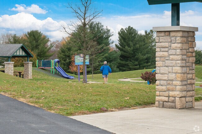 Take a walk on the walking trail at Huffman Park in Pleasant Run Farms.