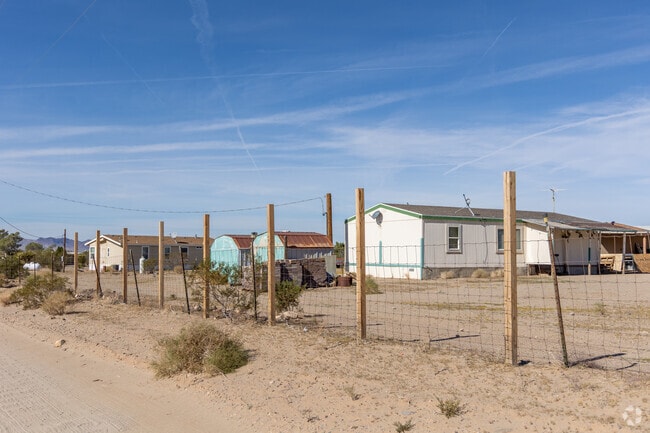 Manufactured homes sit on spacious lots, typical of Dolan Springs housing options.