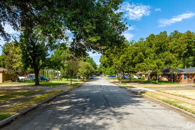 Locals enjoy driving down the tree lined residential streets of Owen Point