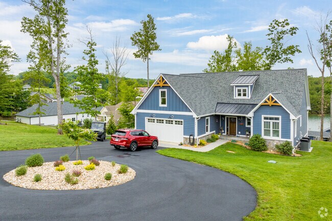 North Shore's craftsman home blends timeless design with access to boating, fishing, and lake recreation.