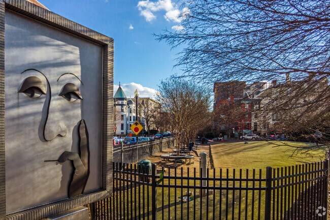 S Street Dog Park features plenty of benches for Dupont Circle pet owners to sit and relax.