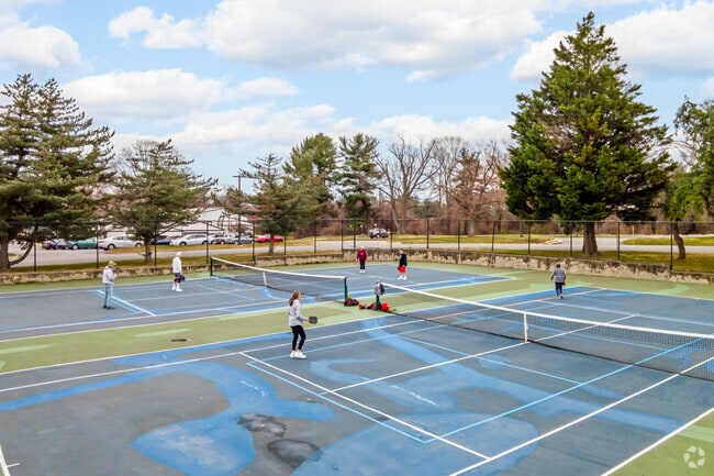 Argyle Park tennis courts provide outdoor recreation near South Four Corners.