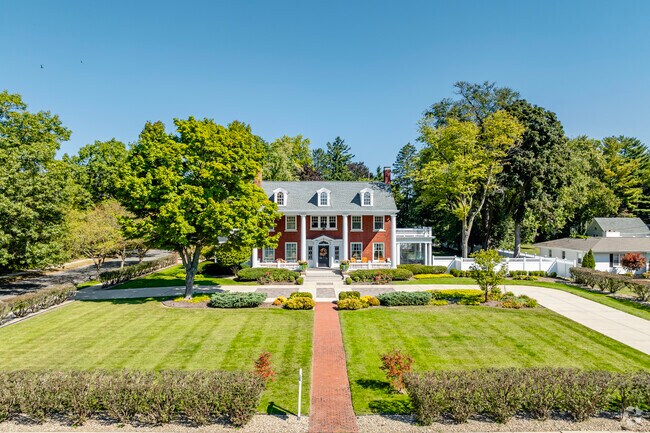Massive mansions along Sunnymede's stretch of East Jefferson feature meticulous landscaping.