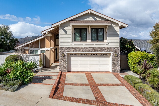 This mid century modern inspired home in Crown Valley Highlands has two levels.