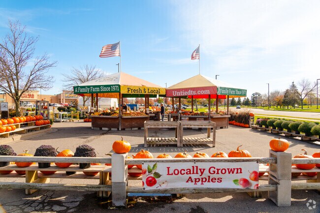 Locally grown fruits and other goods being sold in the fall at near the Shoppes at Arbor Lakes.