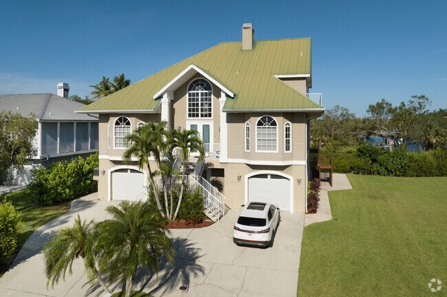 Large three-story home in the Arbell neighborhood near the Imperial River.